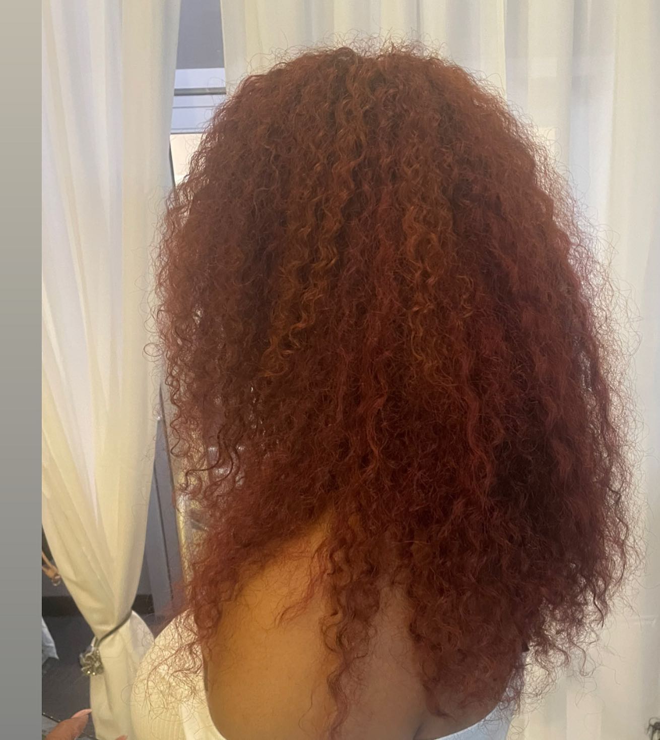 Experience the Elegance of Unprocessed Single Donor Curl Hair Extensions - Sew Hair Extensions, Charlotte NC